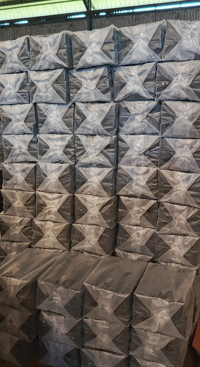 High Stacked Export Ready Charcoal Cartons Warehouse